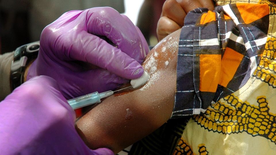 COVID-19 vaccines being administered as part of a humanitarian initiative in a lower income nation.