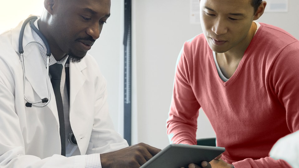 A doctor going over results with a patient