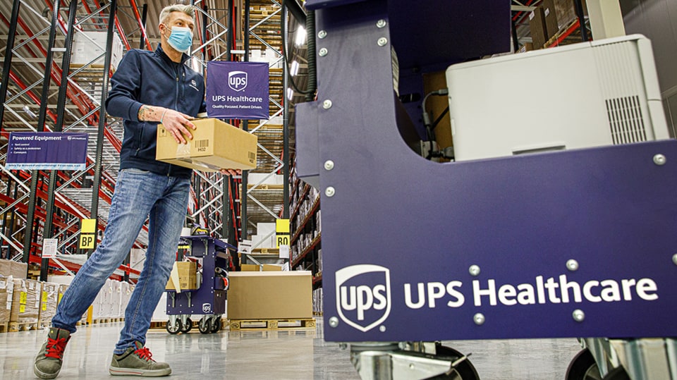 A healthcare employee working in warehouse.