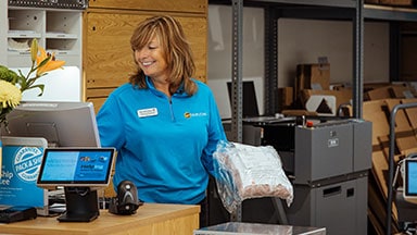 Employee working behind counter