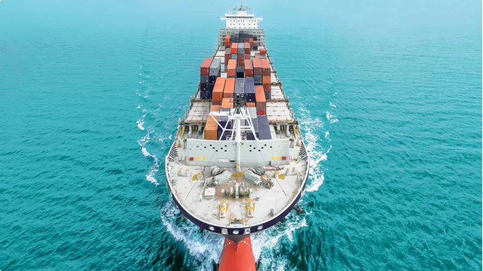 Freight container ship in the middle of the ocean