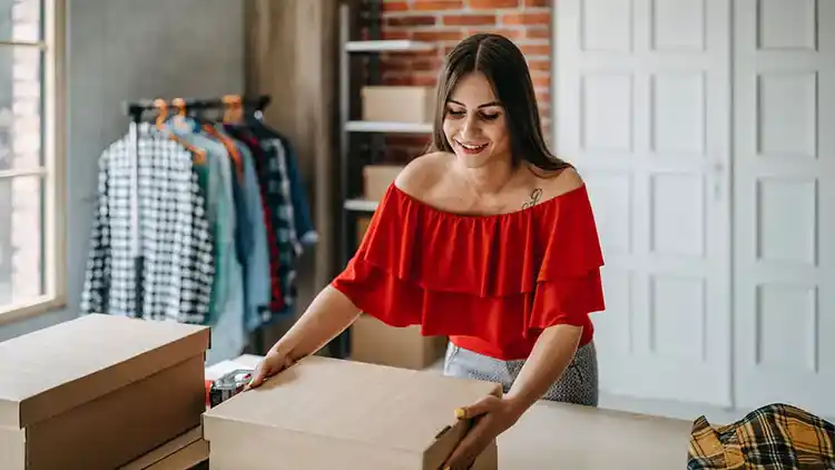 Business woman shipping a package