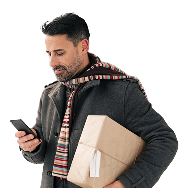 A man looking for UPS locations on mobile while holding a parcel