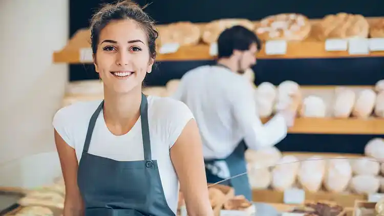 Woman working at a bakery