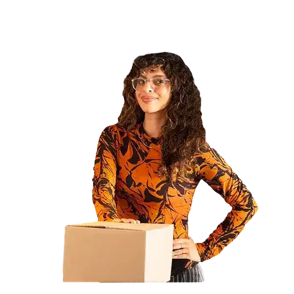 A person posed with box in front of them.