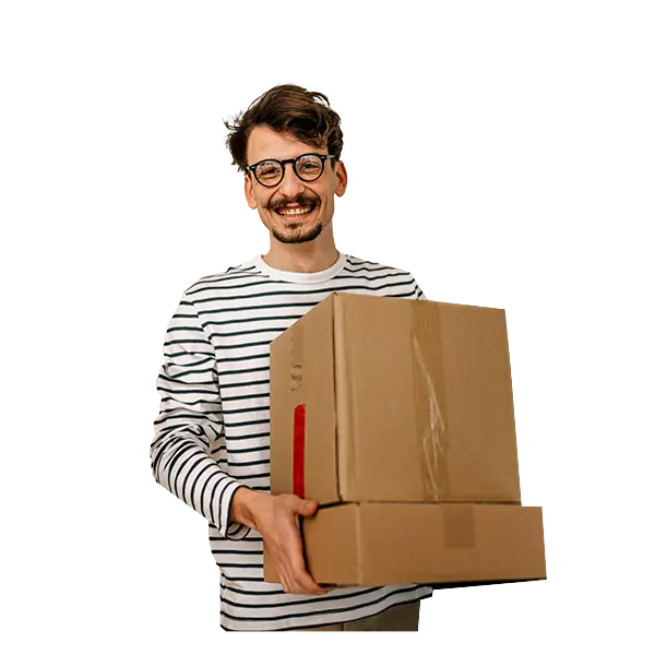 Person in striped shirt holding parcels to ship with UPS.