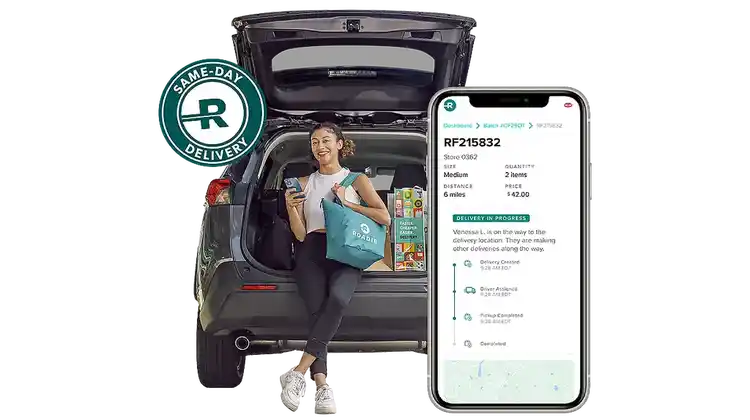 Customer on Car and Phone Displaying Roadie