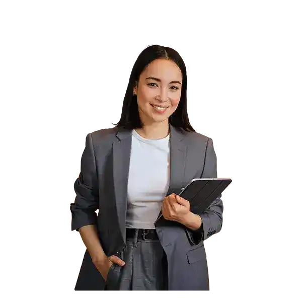 A business owner smiling and holding a tablet.